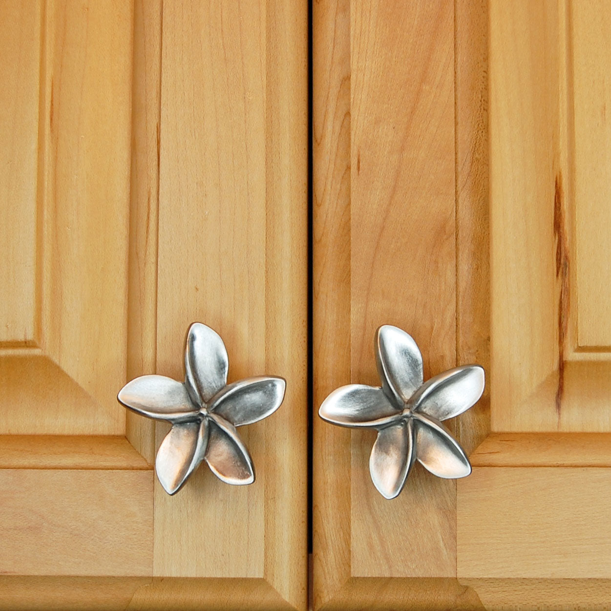 PLumerias knobs install on cabinet doors