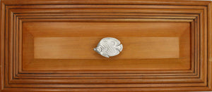 Left facing Butterfly fish installed on wood drawer - full view