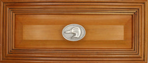 Left facing Mallard Head Knob installed on wood drawer - full view