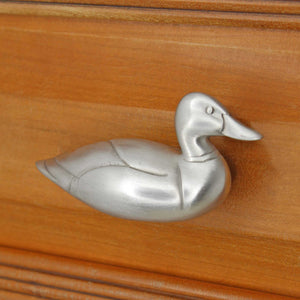 Right facing Mallard Knob installed on wood drawer - angled view
