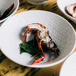 Photo by Rachel Claire: https://www.pexels.com/photo/plates-with-lobster-on-table-5490142/