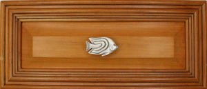 Right facing Angelfish knob installed on wood drawer - full view