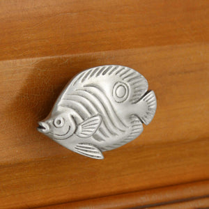 Left facing Butterfly fish installed on wood drawer - square view