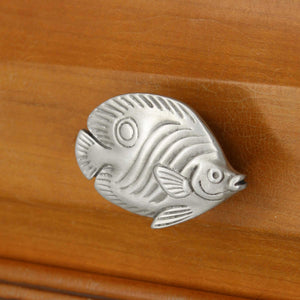 Right facing Butterfly fish installed on wood drawer - angled view