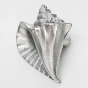 Conch shell knob - left falnge - angled view