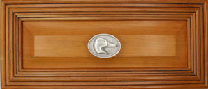 Right facing Mallard Head Knob installed on wood drawer  - full view