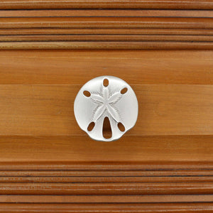 Medium Sand Dollar Knob installed on wood drawer - square view