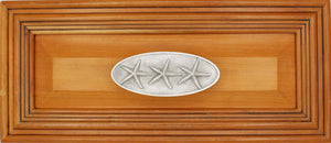 Triple starfish drawer pull installed on wood drawer  - full view